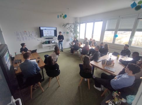 The team at a town hall meeting